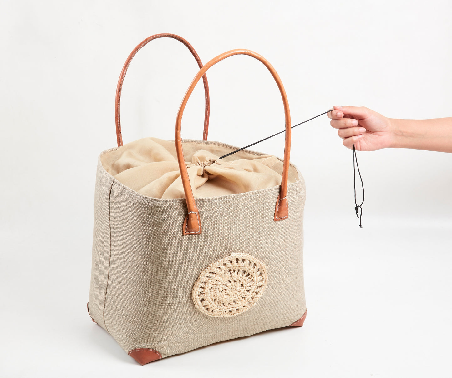 Beige crochet handbag